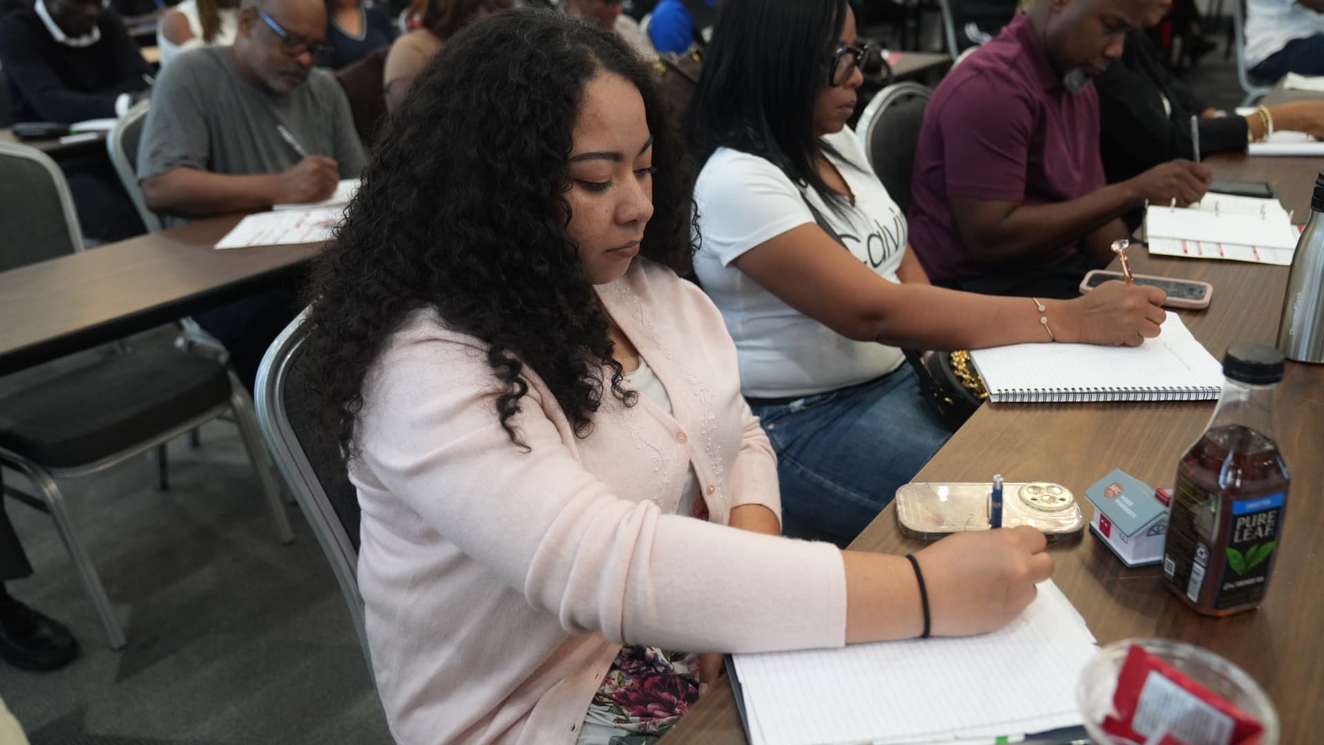 Luther Ragsdale multifamily real estate workshop — investors collaborating during classroom exercises